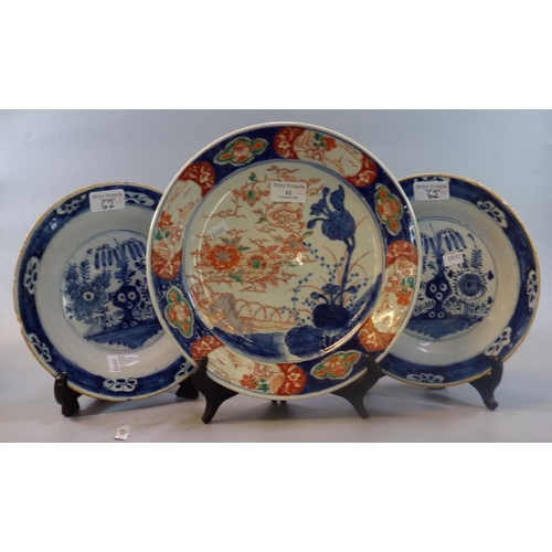 62 - Pair of 18th/early 19th century Dutch tin glazed blue and white Oriental design pottery plates, deco... 