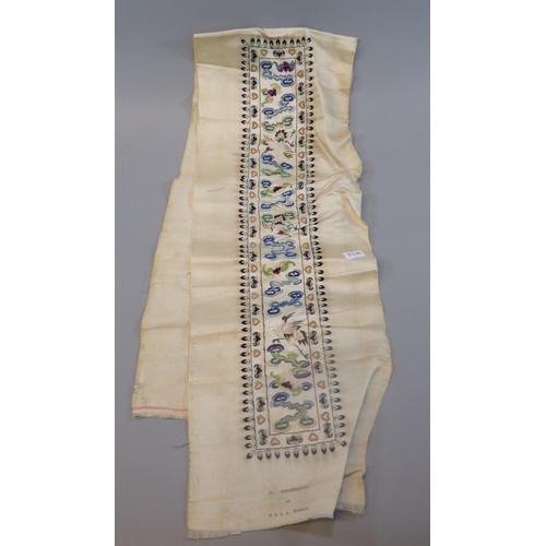 67 - Chinese Quing embroidered silk sleeve section decorated with cranes amongst clouds within stylised b... 