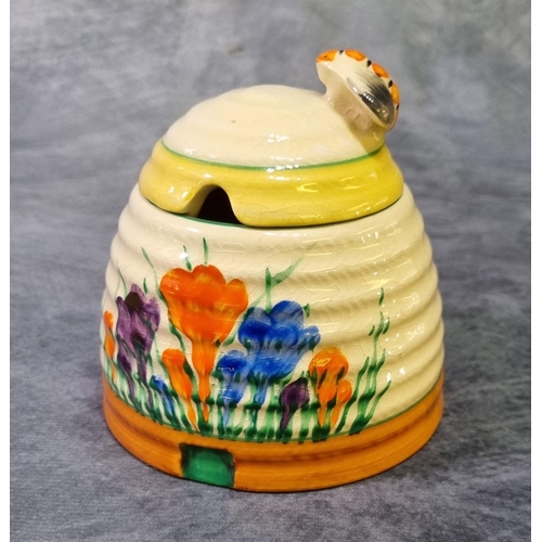 177 - Clarice Cilff Beehive preserve jar and cover, decorated in the crocus pattern. Green printed marks t... 