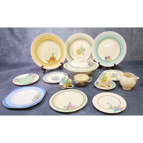 183 - A large collection of Clarice Cliff pottery items to include: lidded tureen, various plates with flo... 