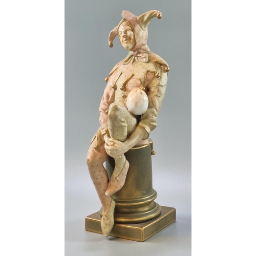 200 - Late 19th century Doulton Burslem figure, 'Jester' resting on a plinth. Signed by Noke  25cm high ap... 