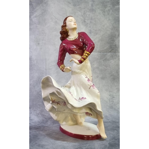 209 - Royal Dux porcelain study of a Gypsy dancer with flowing floral dress on an oval base. Pink mark and... 