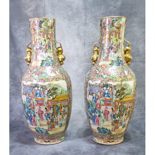 214 - A pair of 19th Century Chinese porcelain Canton famille rose figural floor vases with panels of cour...