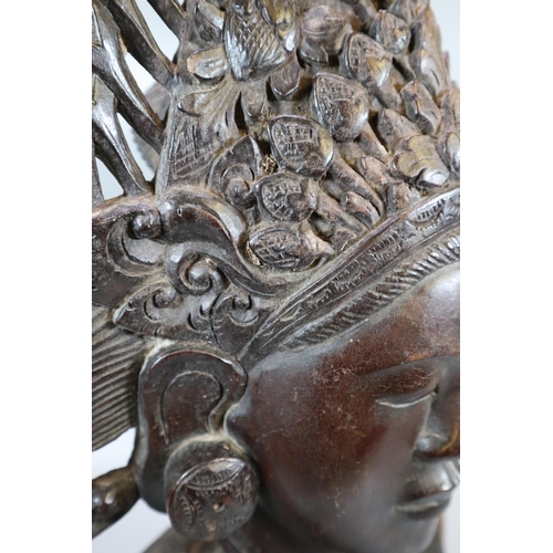 229 - Carved hardwood Balinese bust of a woman in unusual headdress.  Probably 20th century.  53cm high ap... 