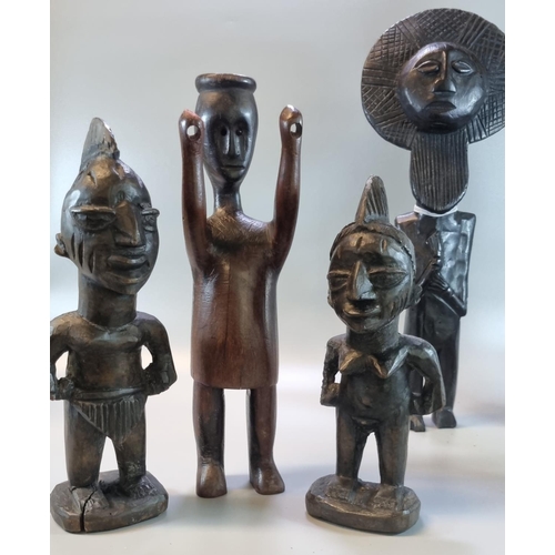 230 - A group of carved wooden ethnic figures, African, Balinese etc.  21cm high up to 52cm high approx.  ... 