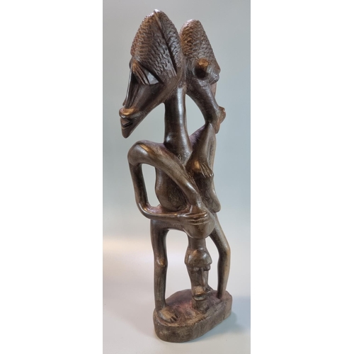 230 - A group of carved wooden ethnic figures, African, Balinese etc.  21cm high up to 52cm high approx.  ... 