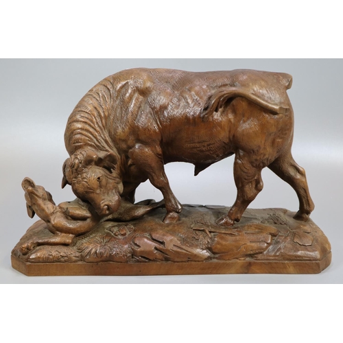 231 - Johann Huggler (1834-1912), a Black Forest carved probably walnut figure group of a bull goring a ho... 