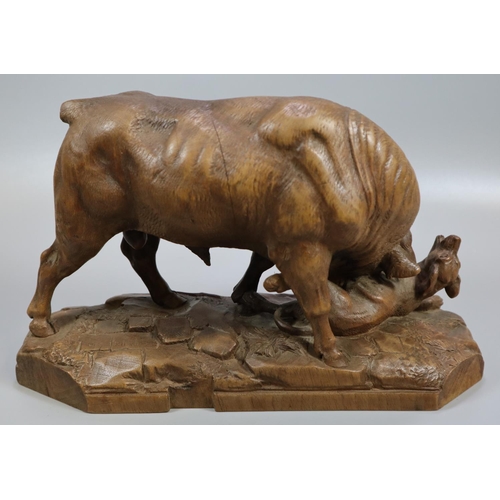 231 - Johann Huggler (1834-1912), a Black Forest carved probably walnut figure group of a bull goring a ho... 