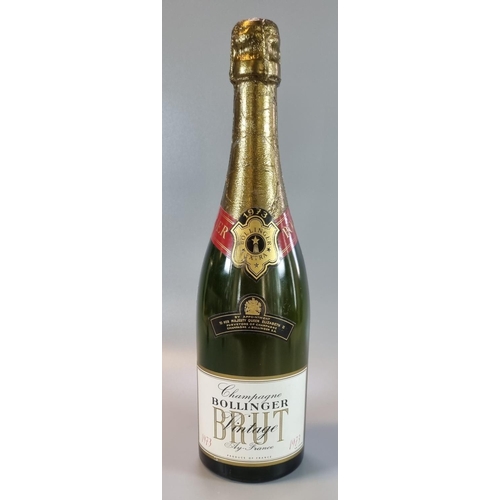 236 - Bottle of Bollinger Extra Vintage Brut champagne, Ay-France 1973, with label 'By Appointment to Her ... 