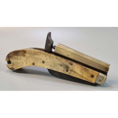 243 - 19th Century percussion muzzle loading brass barrelled penknife pistol, having octagonal tapering br... 