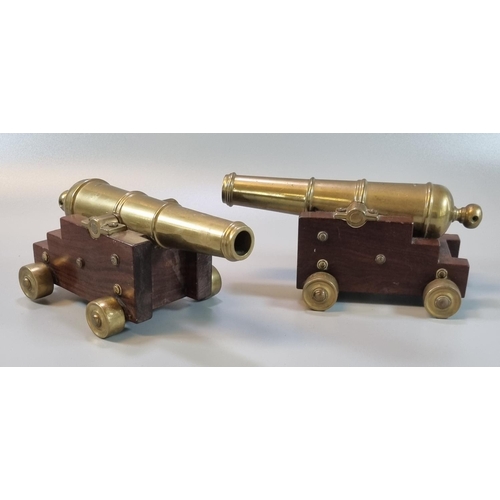 247 - Pair of well made miniature brass and mahogany models of 18th century ships cannon, with stepped car... 
