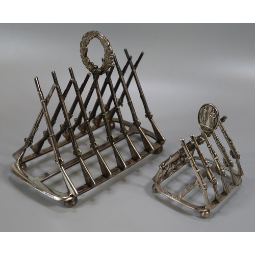 265 - Silver shooting trophy four division toast rack, the divisions in the form of Lee Enfield rifles, ha... 