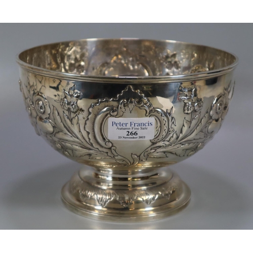 266 - Early 20th Century silver centre bowl, overall with repousse floral and foliate decoration with vaca... 