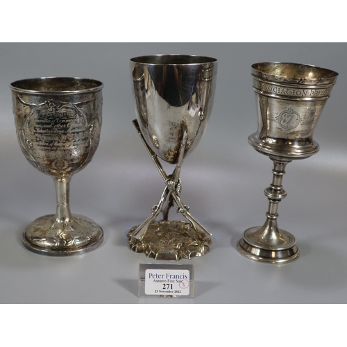 271 - Three silver and silver plate trophy cups to include: vine leaf repousse decorated cup presented by ... 