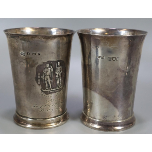 272 - A group of silver shooting trophy cups or beakers to include: Bisley 1906 and another similar. With ... 