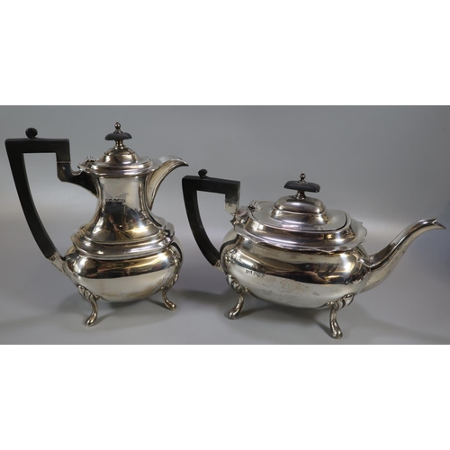 273 - Silver baluster shaped four piece tea and coffee set by Walker & Hall, Sheffield. Comprises; teapot,... 