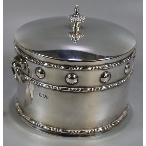 274 - Silver Arts & Crafts design silver drum shaped two handled box and cover. The dome cover with fluted... 