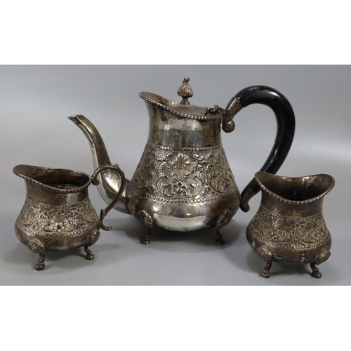 277 - White metal, probably Indian silver, three piece baluster shaped bachelor's teaset. The individual p... 