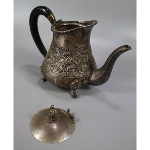 277 - White metal, probably Indian silver, three piece baluster shaped bachelor's teaset. The individual p... 