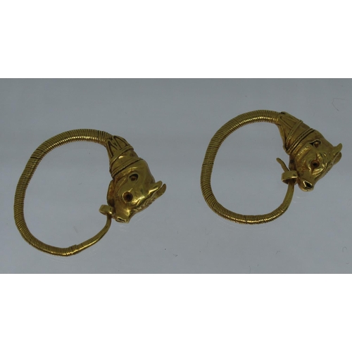 323 - A pair of Greek Bull's Head earrings.  Together with Southeby's sale tags 15th July 1980.  Approx we... 