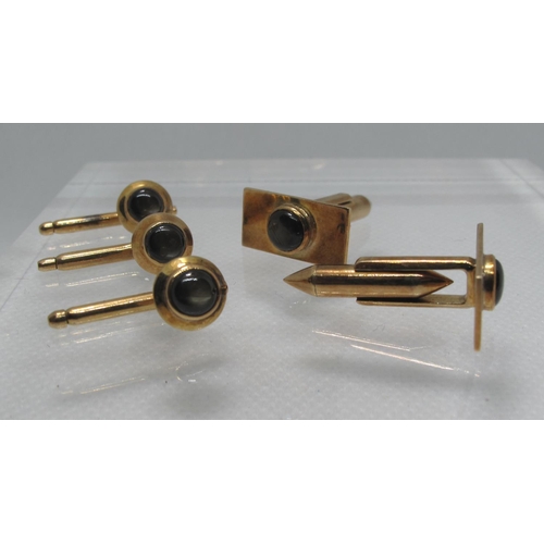 331 - A cased set of 14ct gold cufflinks with three matching studs.  Stamped, 'Alex' and 14K.  In 'Alex & ... 