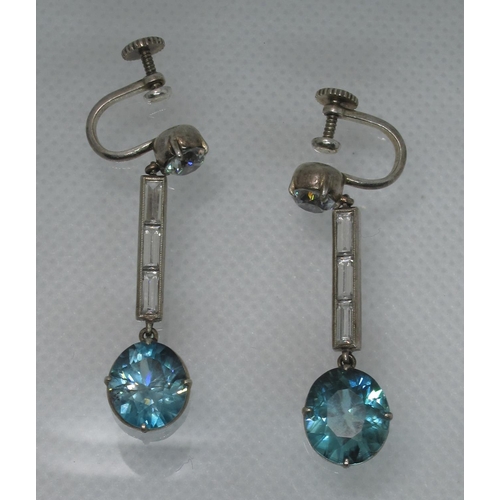 333 - A pair of Art Deco blue and white zircon earrings with screw back fittings.  Approx weight 7.3 grams... 