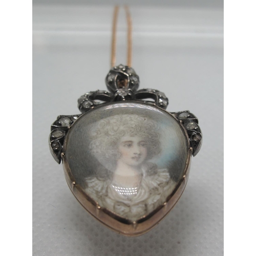 350 - 19th century painted portrait pendant depicting a lady in 18th century dress, the frame decorated wi... 