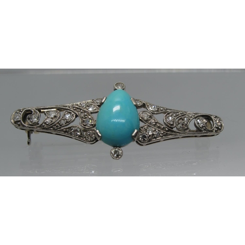 352 - An Art Nouveau diamond and turquoise brooch.  Approx weight 4.3 grams.
(B.P. 21% + VAT)