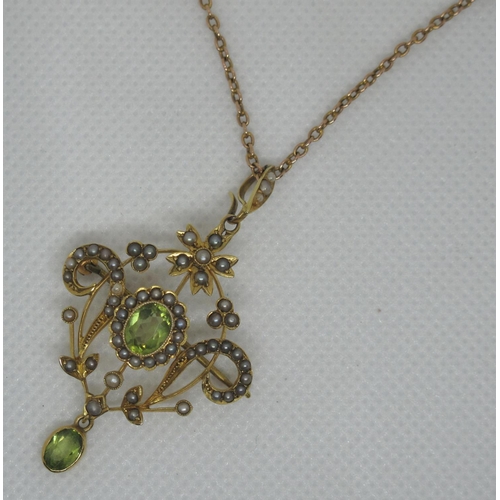 353 - 9ct gold Art Nouveau pendant set with peridot and pearls on 9ct gold chain.  Approx weight 7.8 grams... 