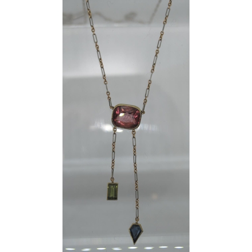 354 - Art Deco Pink stone pendant with green tourmaline and sapphire drops.  Approx weight 4.3 grams.
(B.P... 