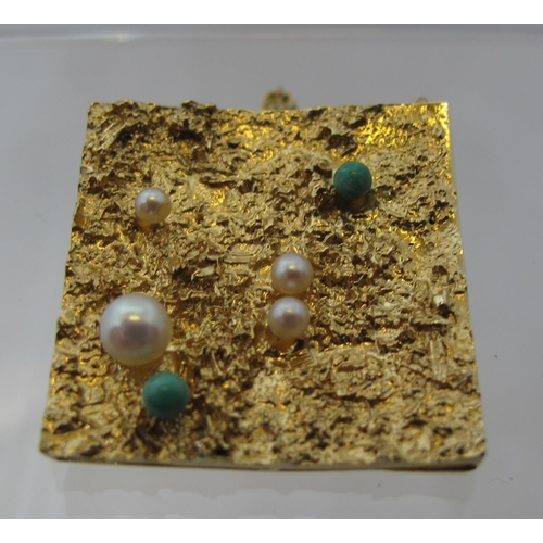 358 - A modern 9ct textured gold brooch set with pearls and turquoise.  Approx weight 8 grams.
(B.P. 21% +... 