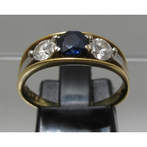 364 - 18ct gold three stone diamond and sapphire ring.  Ring size M.  Approx weight 4.1 grams.
(B.P. 21% +... 