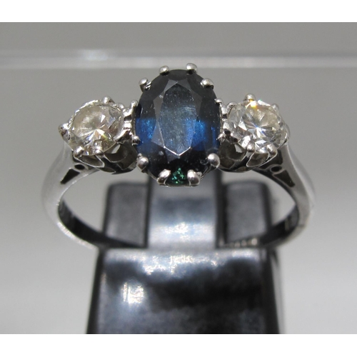 366 - Three stone diamond and sapphire ring.  Ring size N. Approx weight 2.5 grams.
(B.P. 21% + VAT)