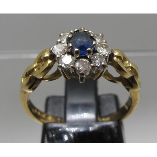 372 - 18ct gold sapphire and diamond ring.  Ring size M.  Approx weight 3.7 grams.
(B.P. 21% + VAT)