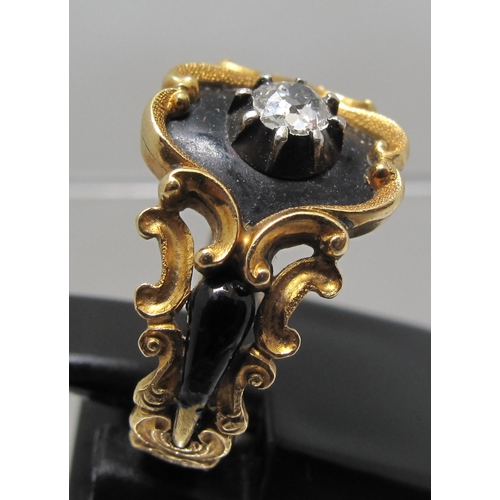 373 - William IV 18ct gold mourning ringset with a diamond on a black enamel ground within a scrolling gol... 