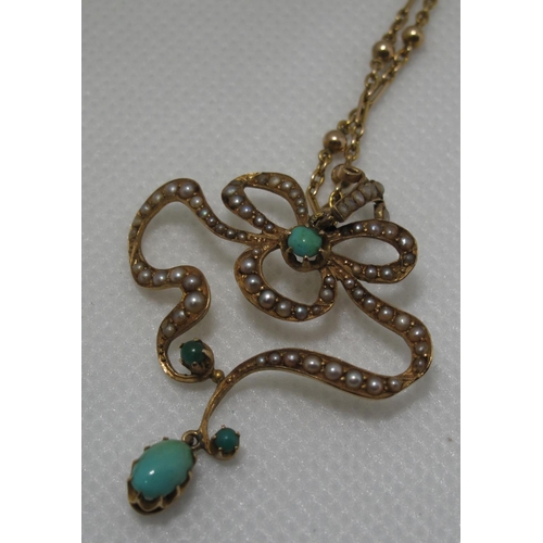 389 - An Art Nouveau pendant set with seed pearls and turquoise on a 9ct gold chain.  Approx weight 7.5 gr... 