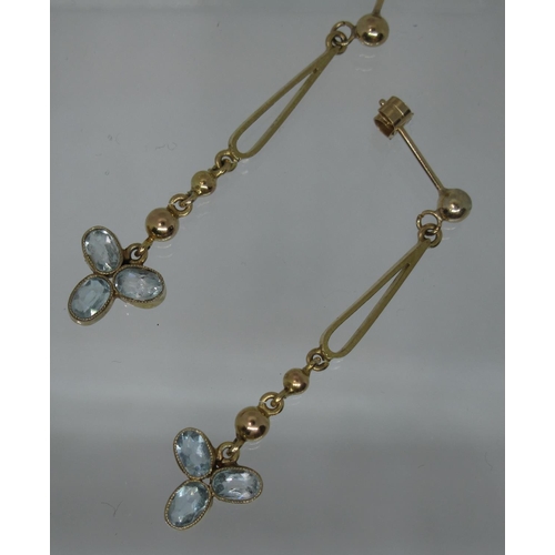 392 - A pair of Edwardian trefoil aquamarine drop earrings.  Length of drop 4cm.  Approx weight 1.6 grams.... 