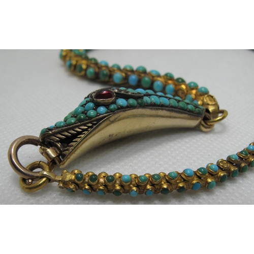 407 - Victoian yellow metal snake necklace with cabochon ruby eyes with diamonds set above.  Approx weight... 