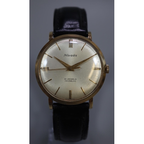 416 - Nivada 9ct gold gentleman's twenty one jewel wristwatch, baton numerals to the satin face, presentat... 