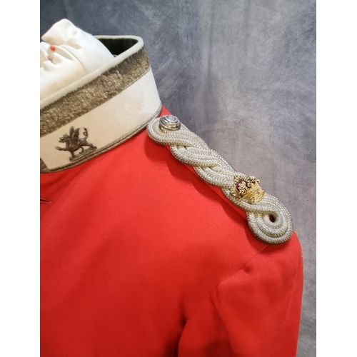 429 - Items of late 19th century British army Welsh Regiment dress uniform, to include: Major's long red t... 