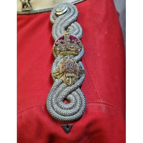 429 - Items of late 19th century British army Welsh Regiment dress uniform, to include: Major's long red t... 