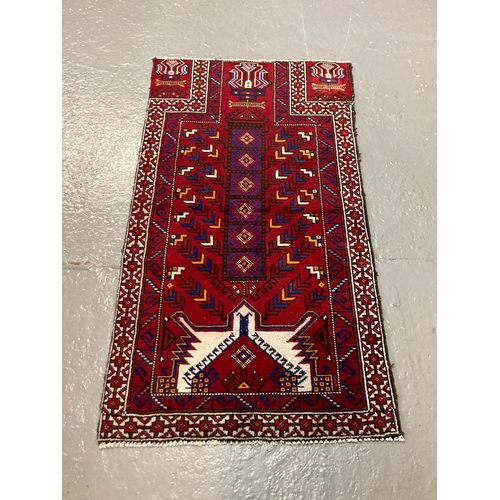 440 - Deep red ground Sardius prayer mat.  184x97cm approx.   (B.P. 21% + VAT)