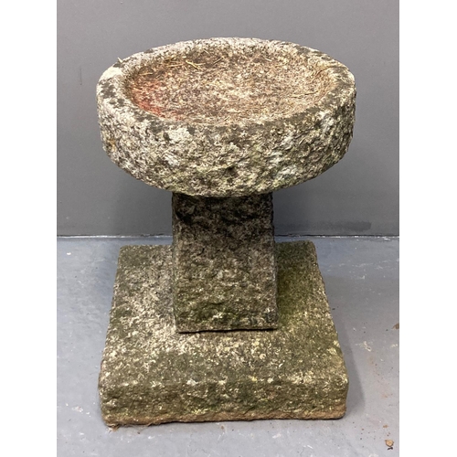 456 - Granite weathered pedestal birdbath with circular top on a square base. 
(B.P. 21% + VAT)