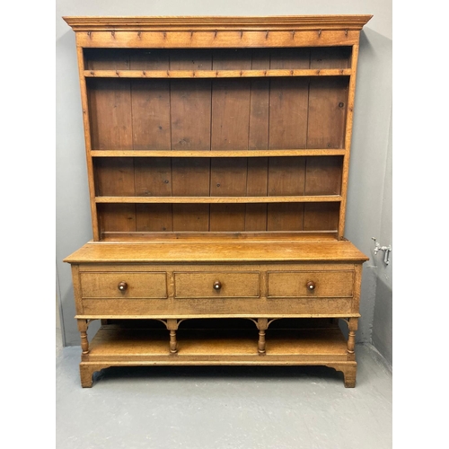 66 - 19th Century pale oak two stage rack back pot board dresser, the moulded cornice above boarded rack ... 