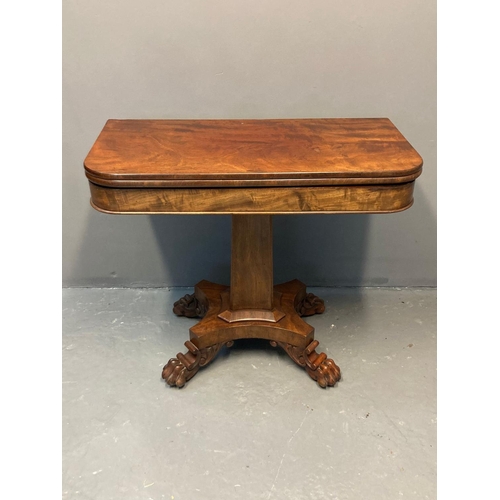 71 - 19th century mahogany tea table standing on a shaped pedestal and four scroll and paw feet.  92x92x7... 