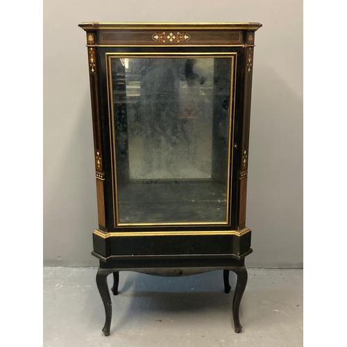 76 - Victorian ebonised gilded and inlaid pier cabinet, the shaped top with canted angles, central glazed... 