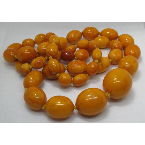 404 - A string of butterscotch amber beads.  Comprising forty five graduated beads.  Approx weight 144.2.
... 