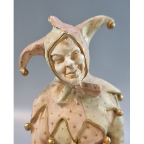 200 - Late 19th century Doulton Burslem figure, 'Jester' resting on a plinth. Signed by Noke  25cm high ap... 