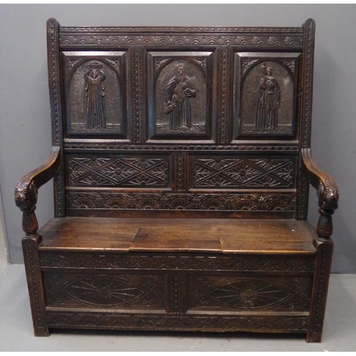 16 - 18th century oak arch backed settle with box seat and scrolled open arms, overall with 19th century ... 