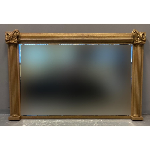 78 - Regency style gilded wooden bevel plate over mantel mirror, having reeded columns and foliate and sc... 